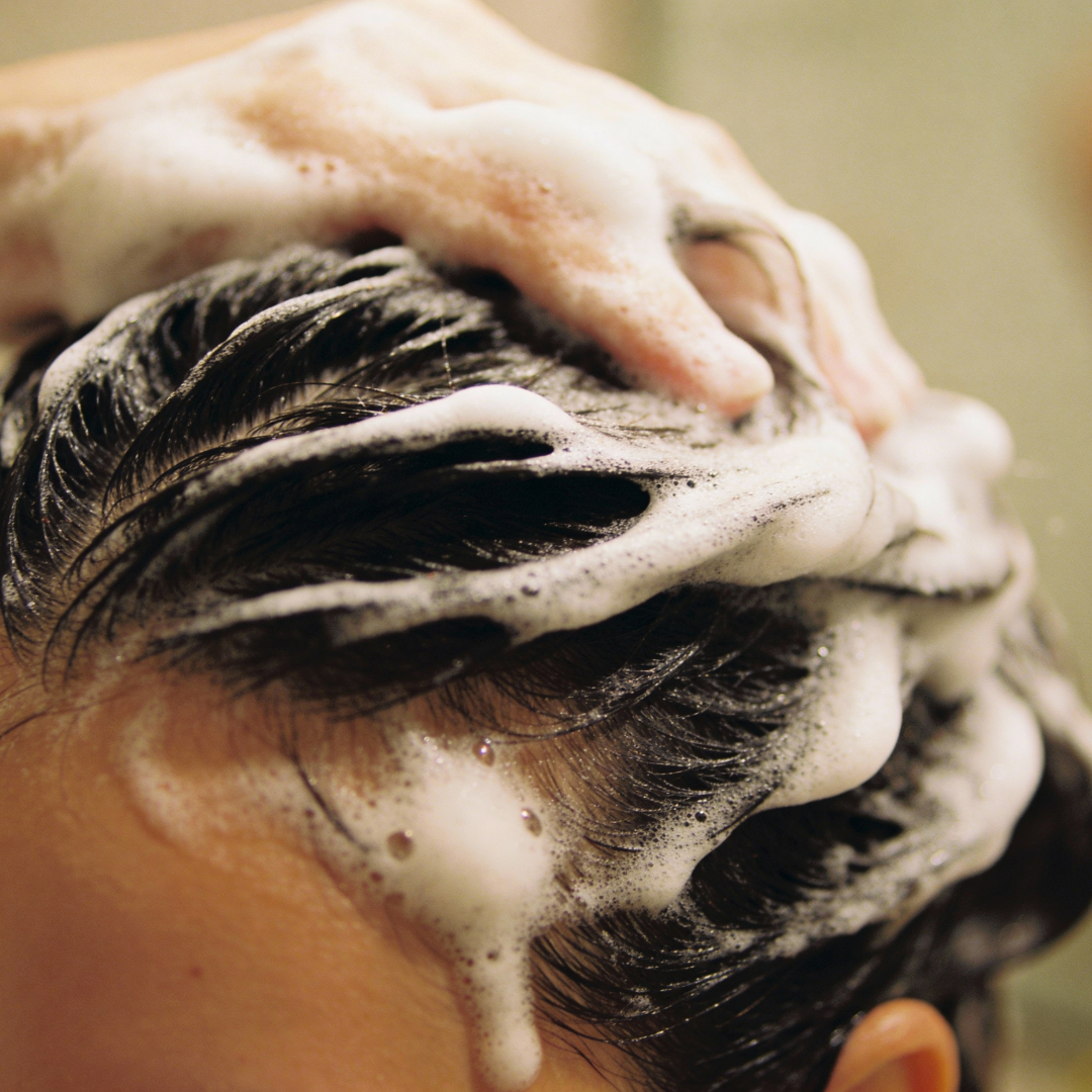 Close-up of lather during a scalp wash